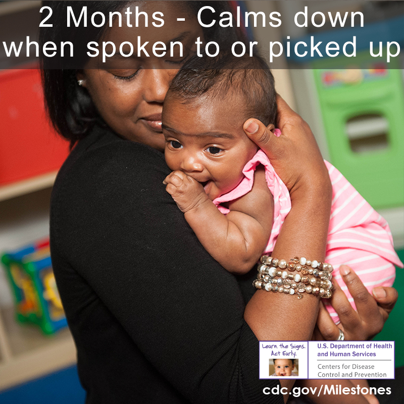Calms down when spoken to or picked up - a baby is calmed down after being picked up by caregiver.