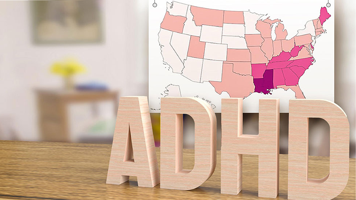 map of united states with the word ADHD in front of map on table