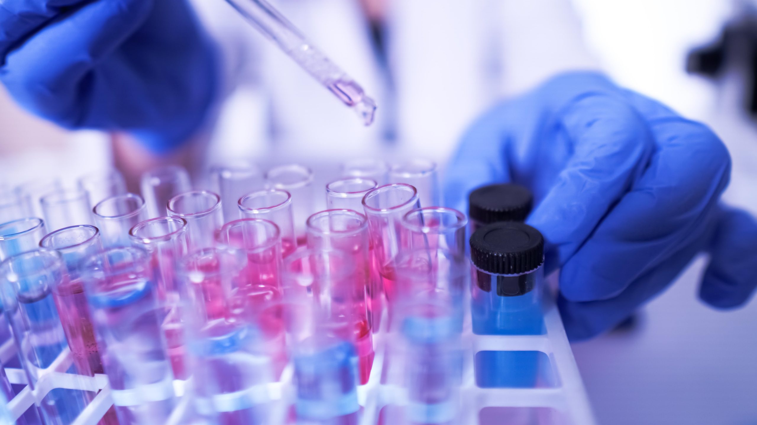 Lab tech with vials