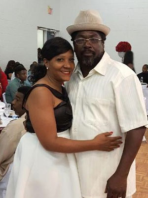 Anniece Minor posing with another person.