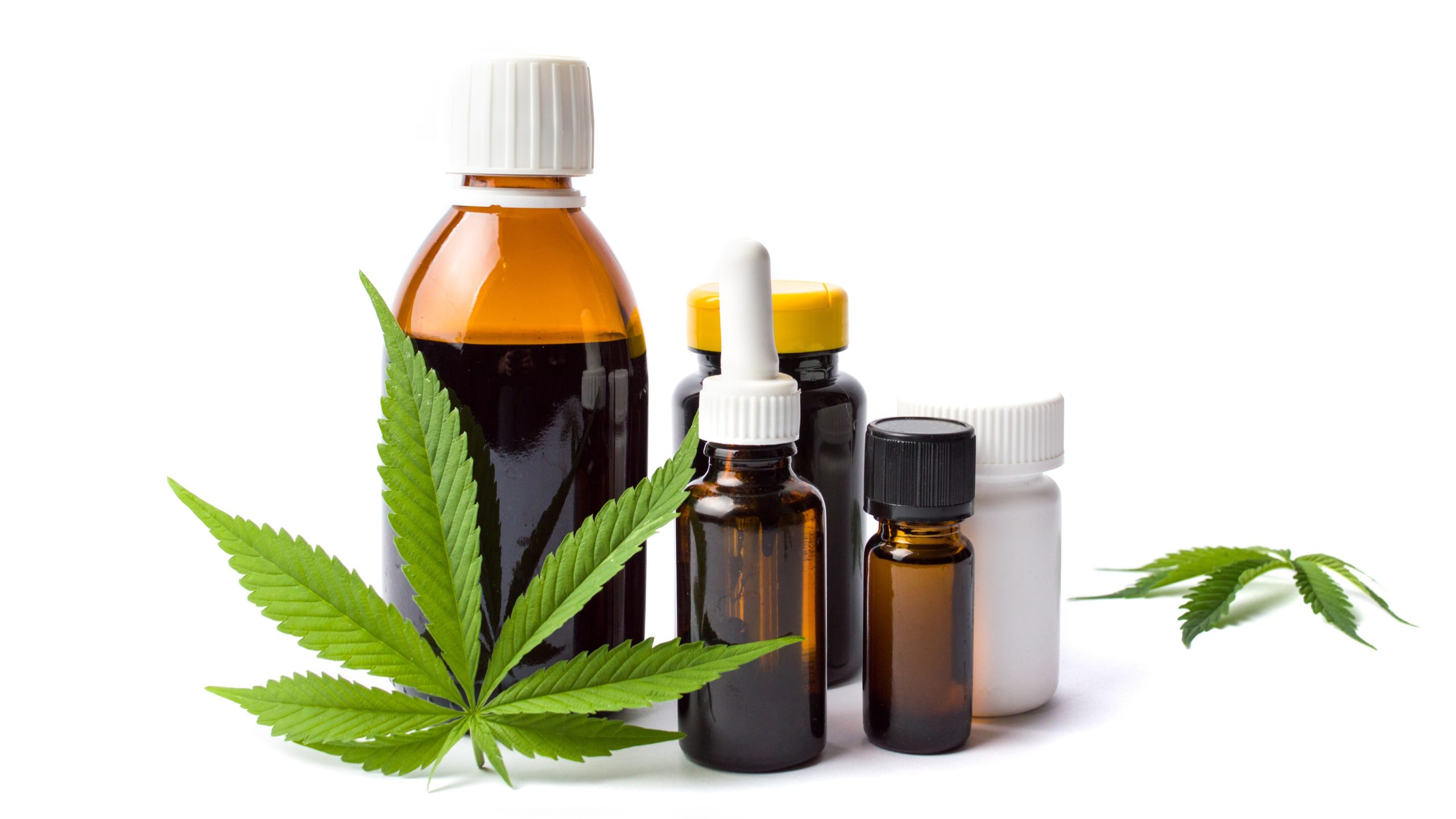 — title missing — Marijuana and cannabis oil bottles isolated