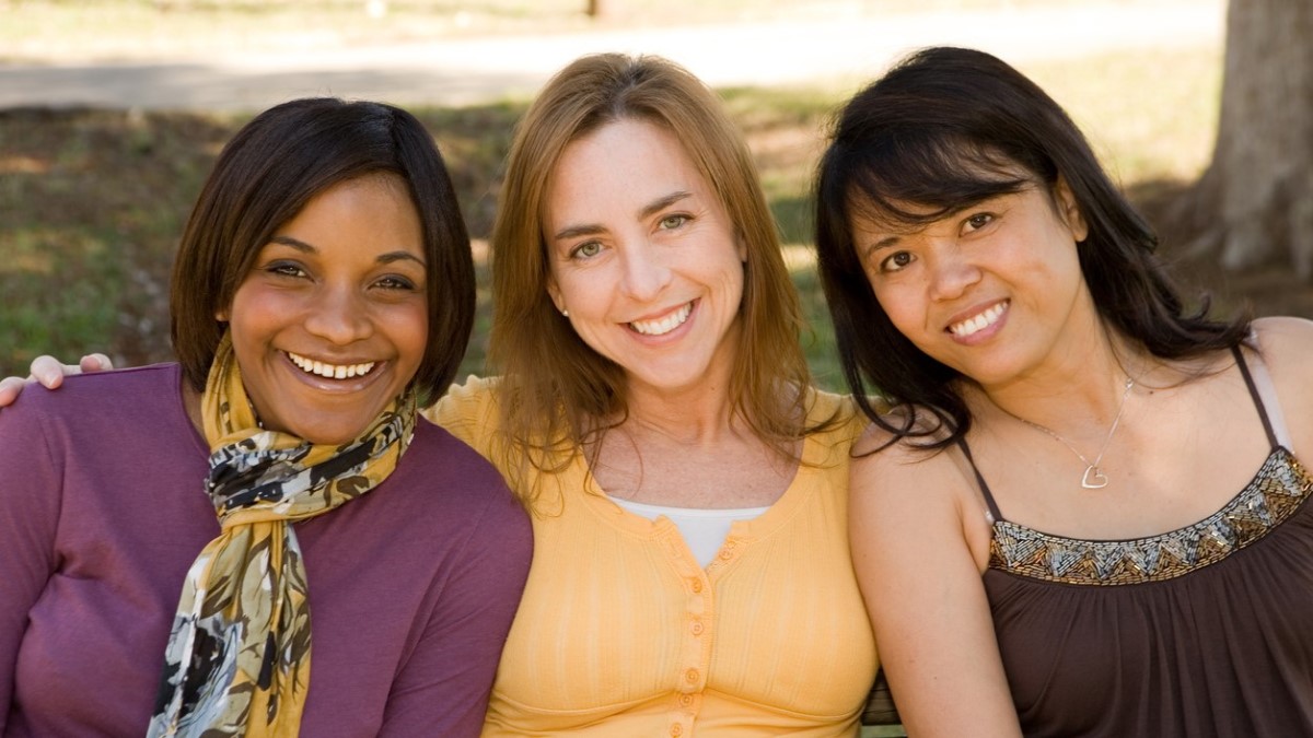 Three young women Three young women smiling