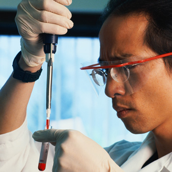Lab worker holding a test tube