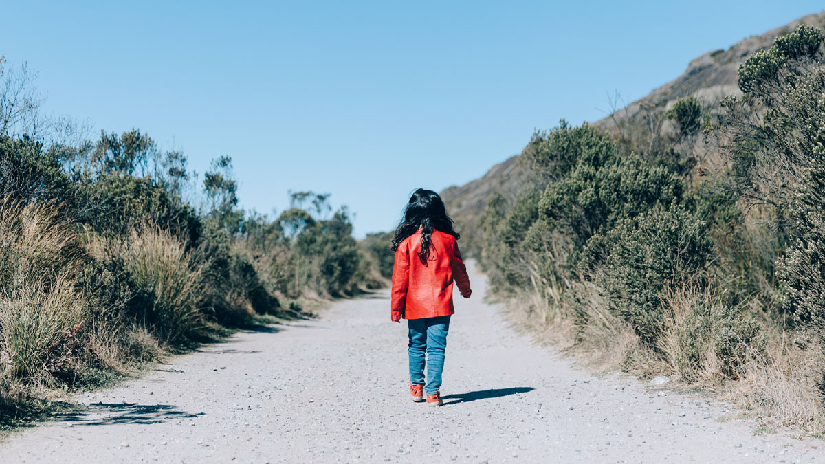 Kid walking alone