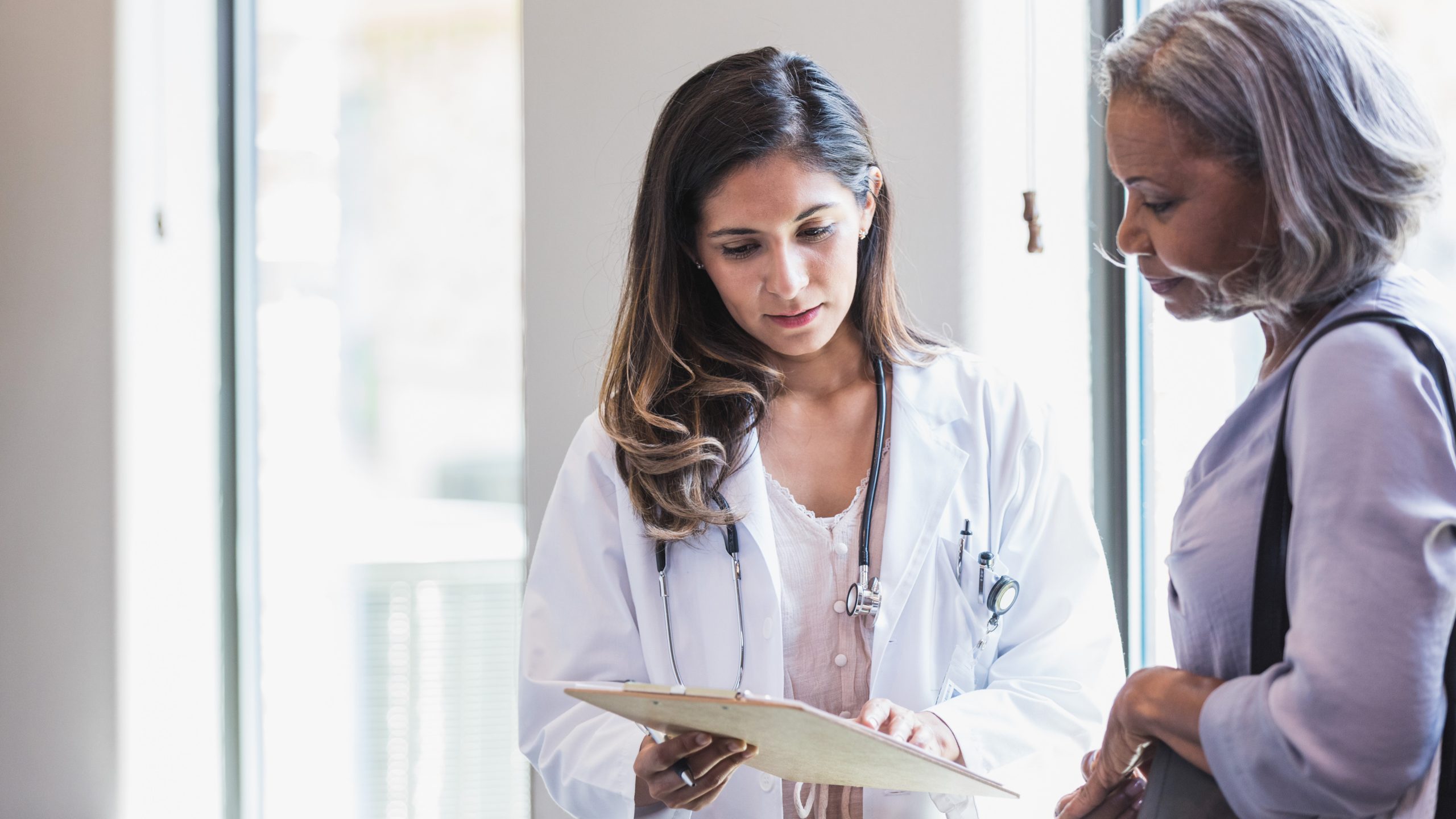 Women talking to her female healthcare provider.