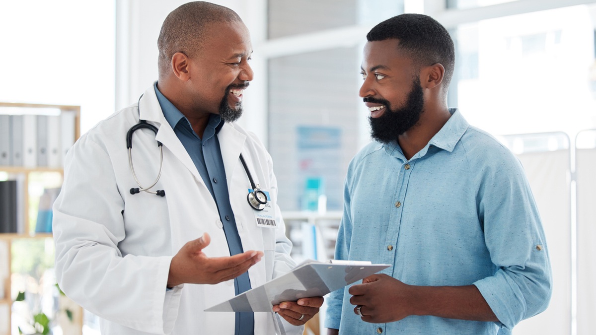 A doctor talking to his patient