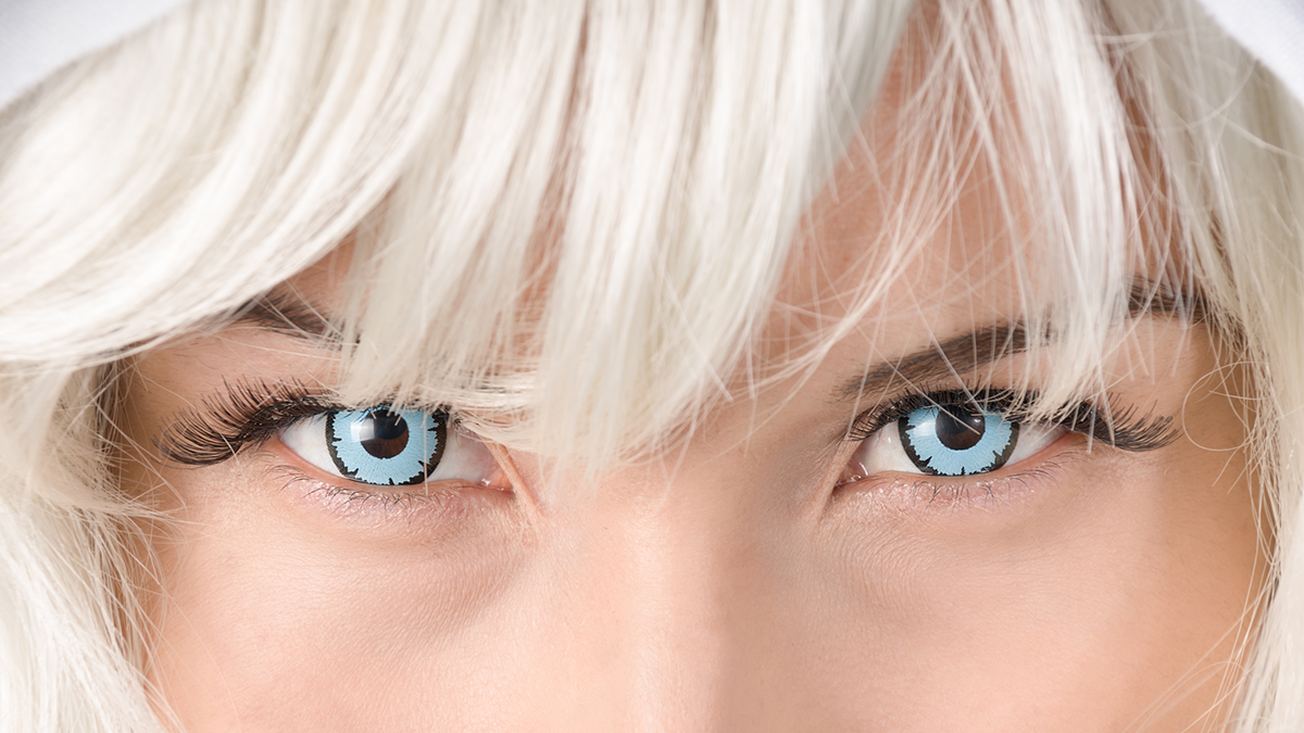 Woman wearing light blue decorative contact lenses