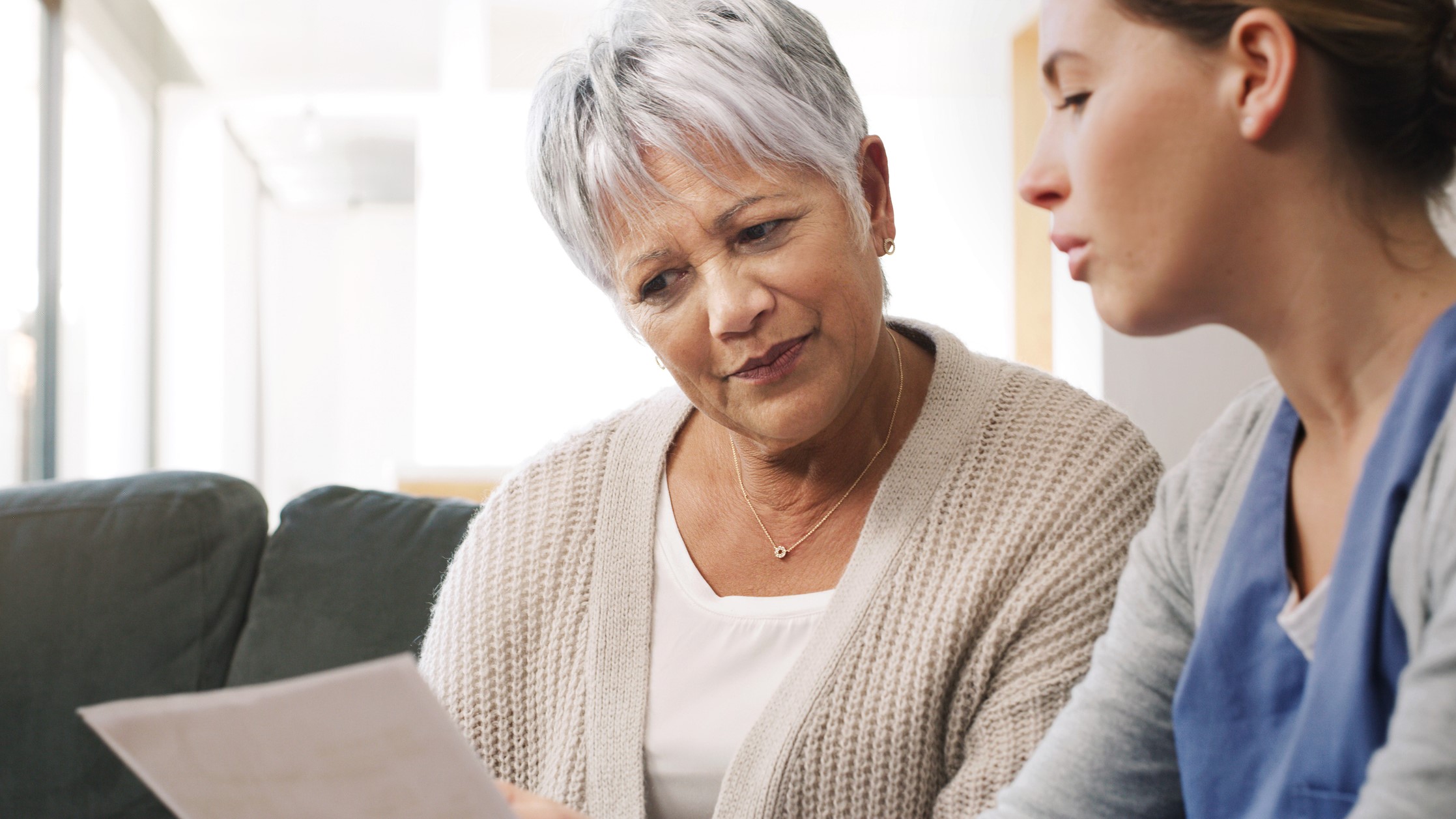 Addressing-health-literacy An educator and participant look at health information together