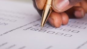 pen in hand on form