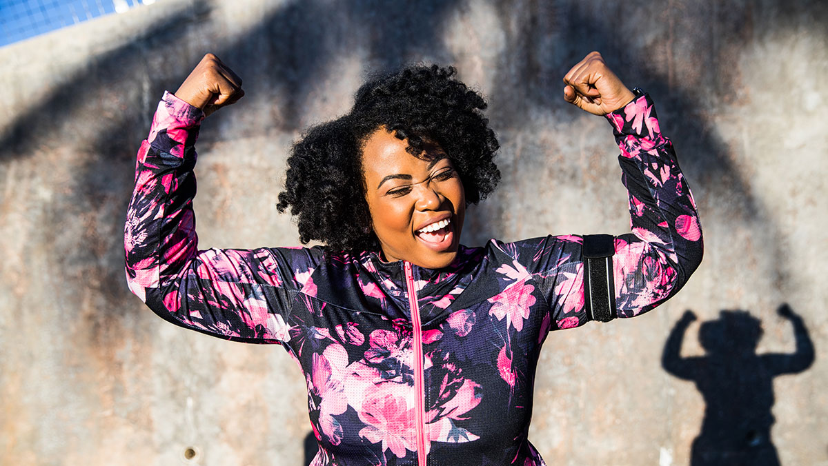 GettyImages-1010069056-cr African American woman raising her arms