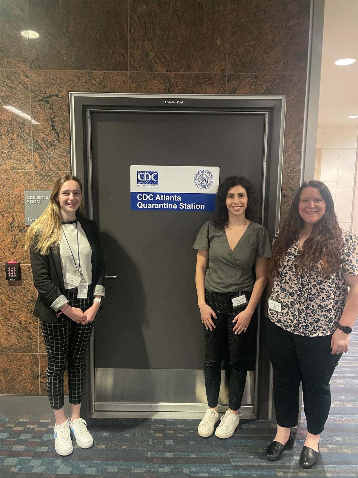 2024 EEP students Chloe, Lily, and Kaitlyn visit the Atlanta airport's port health station and get to view one of the quarantine rooms that would be used for a person who may have an infectious disease that threatens public health.