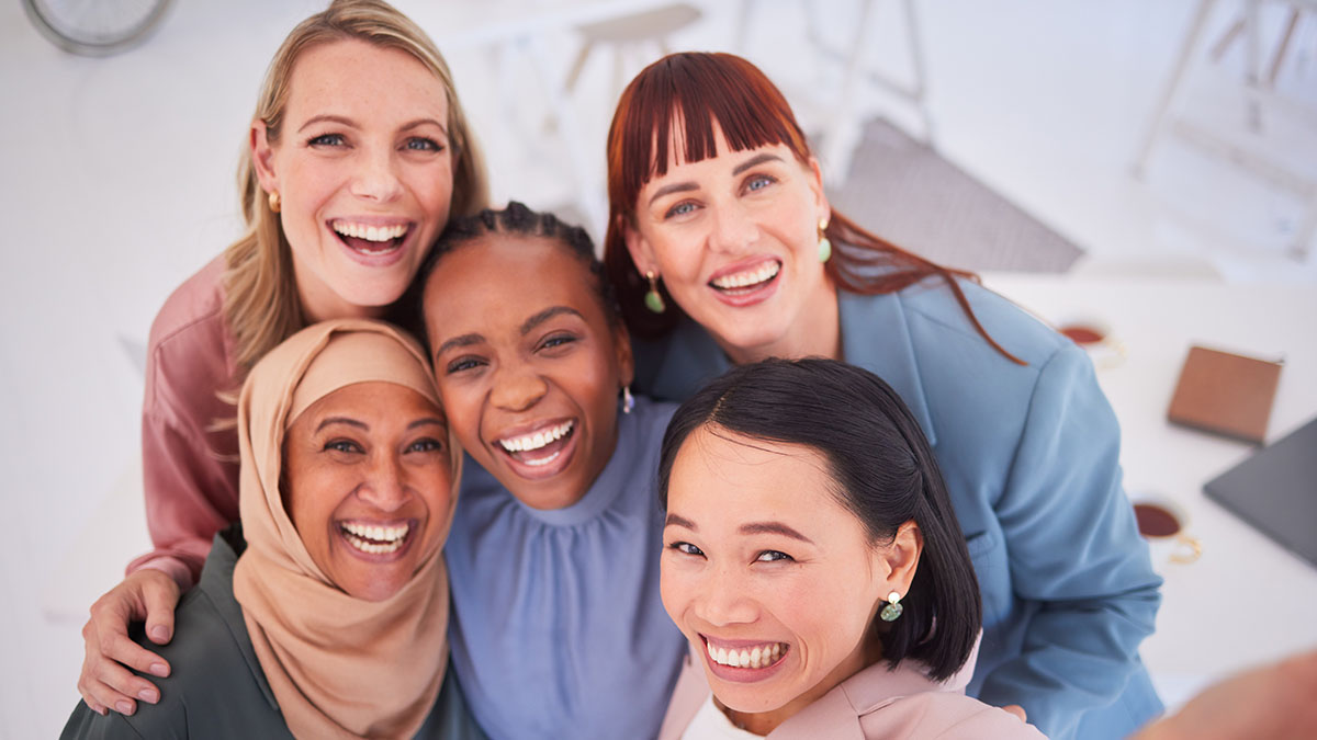 groupofladiestakingselfie1200px.jpg Diverse group of women posing for a picture together