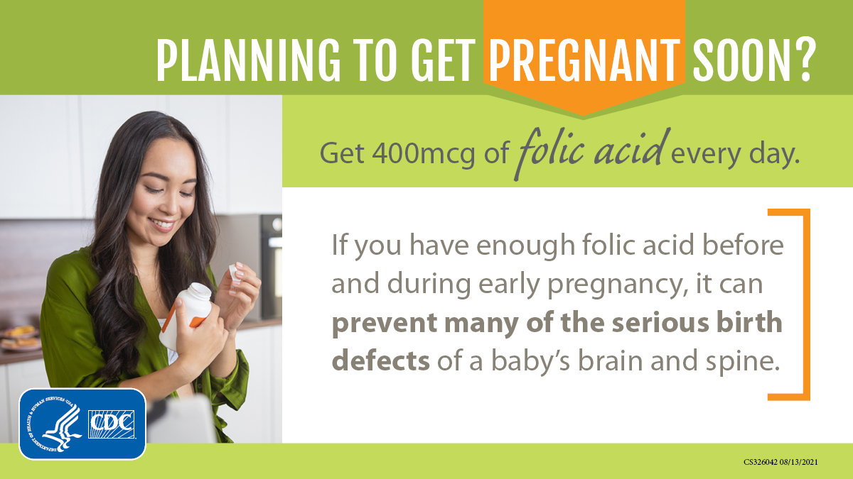 A women reading the label on a supplement bottle with text that reads "Planning to get pregnant soon? Get 400 mcg of folic acid every day."