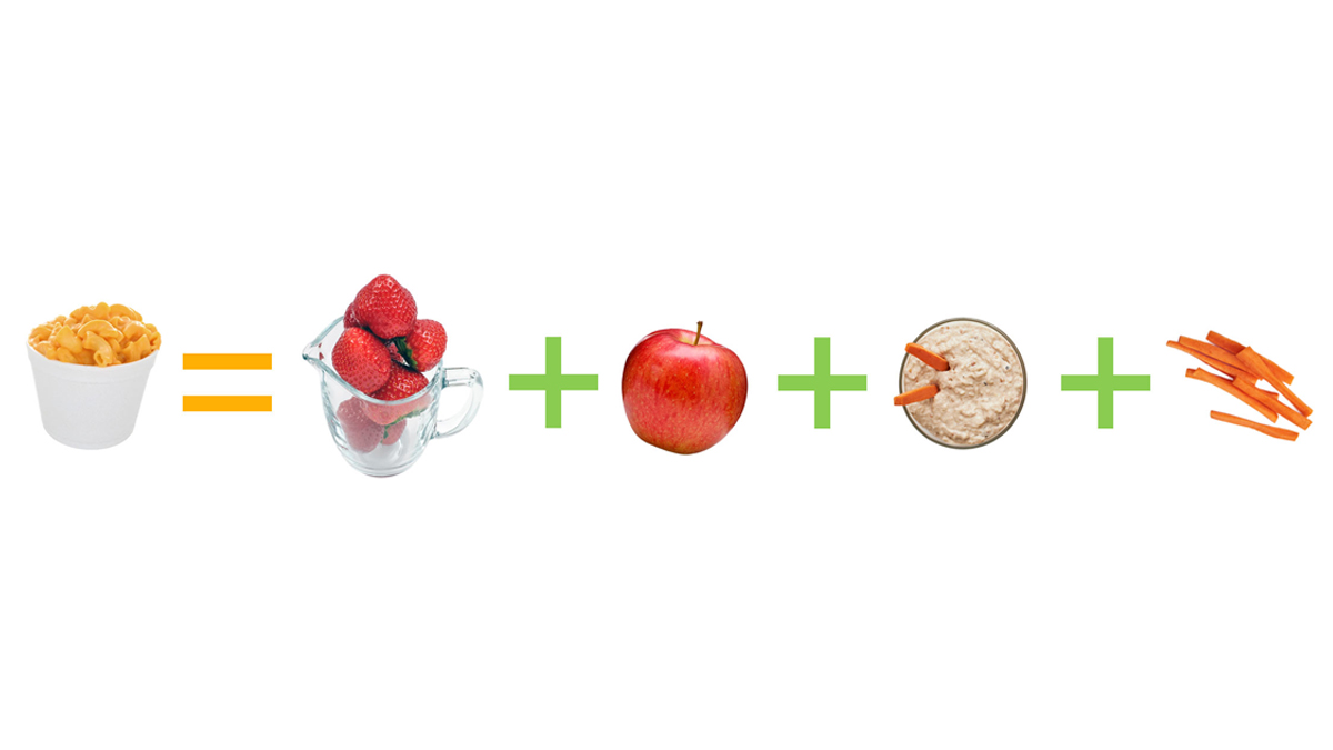 Macaroni and cheese, a cup of strawberries, an apple, and carrots with hummus.