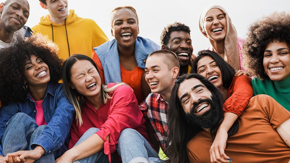 LGBTQ Youth A group of LGBTQ youth smiling.