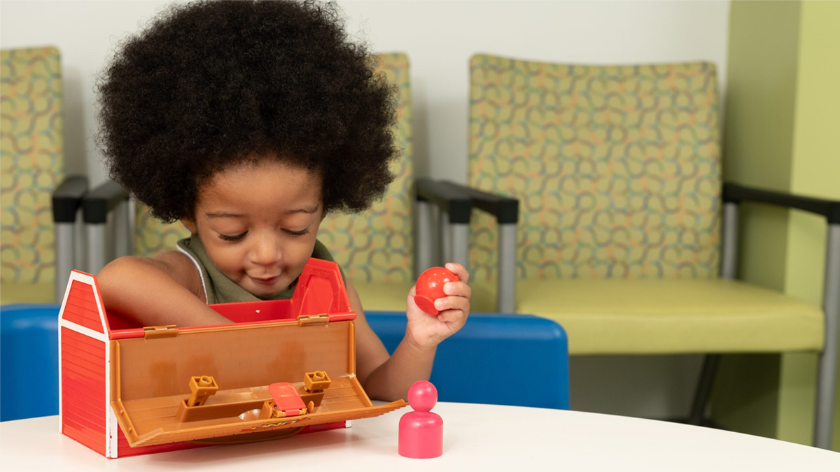 child going through a lunchbox A young child engages in early intervention services
