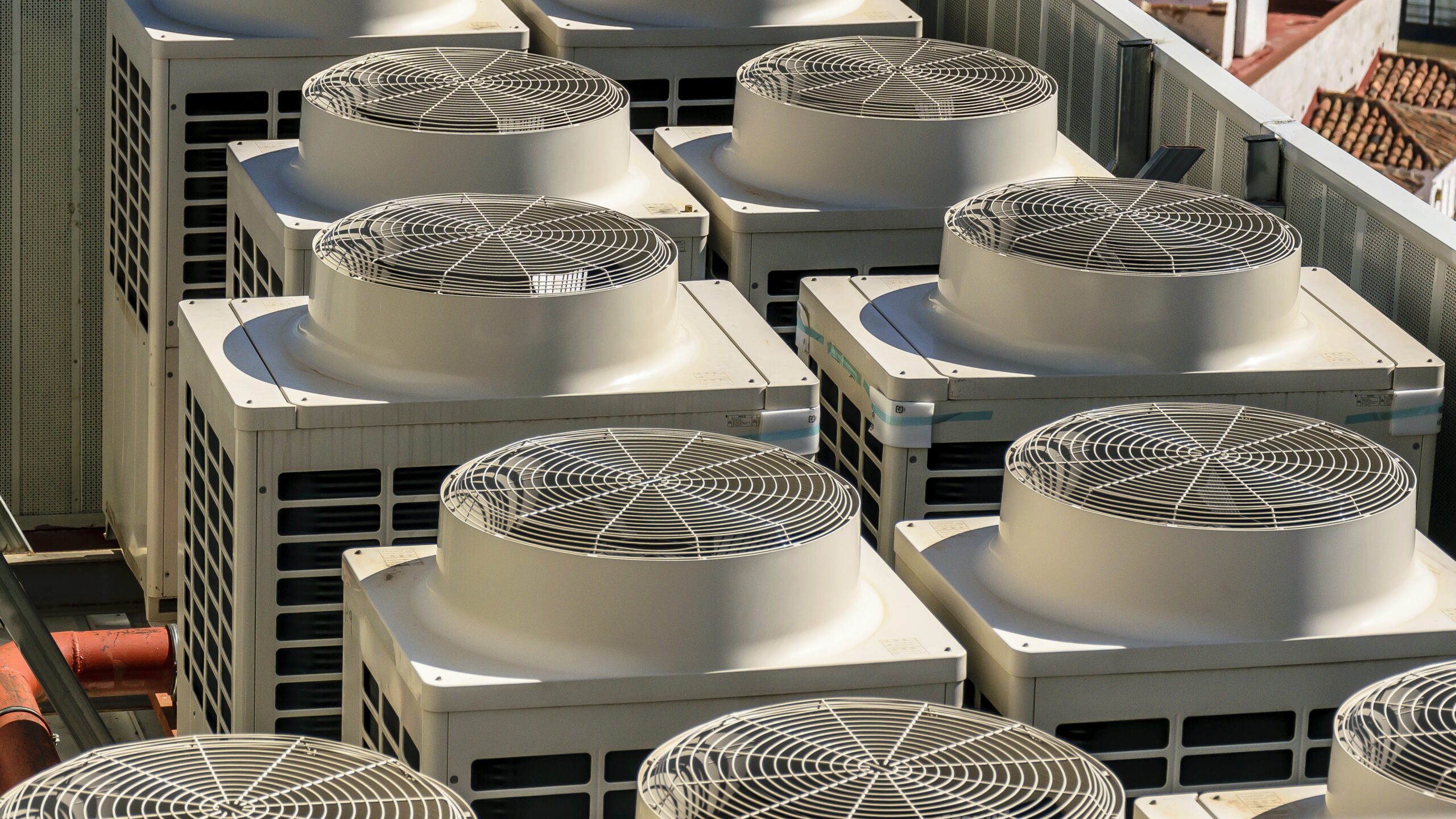 Cooling towers on top of a building.