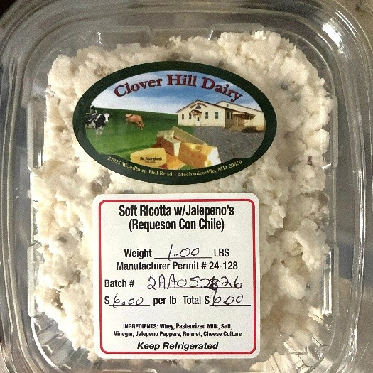 Soft Ricotta with Jalapeños in clear, plastic container
