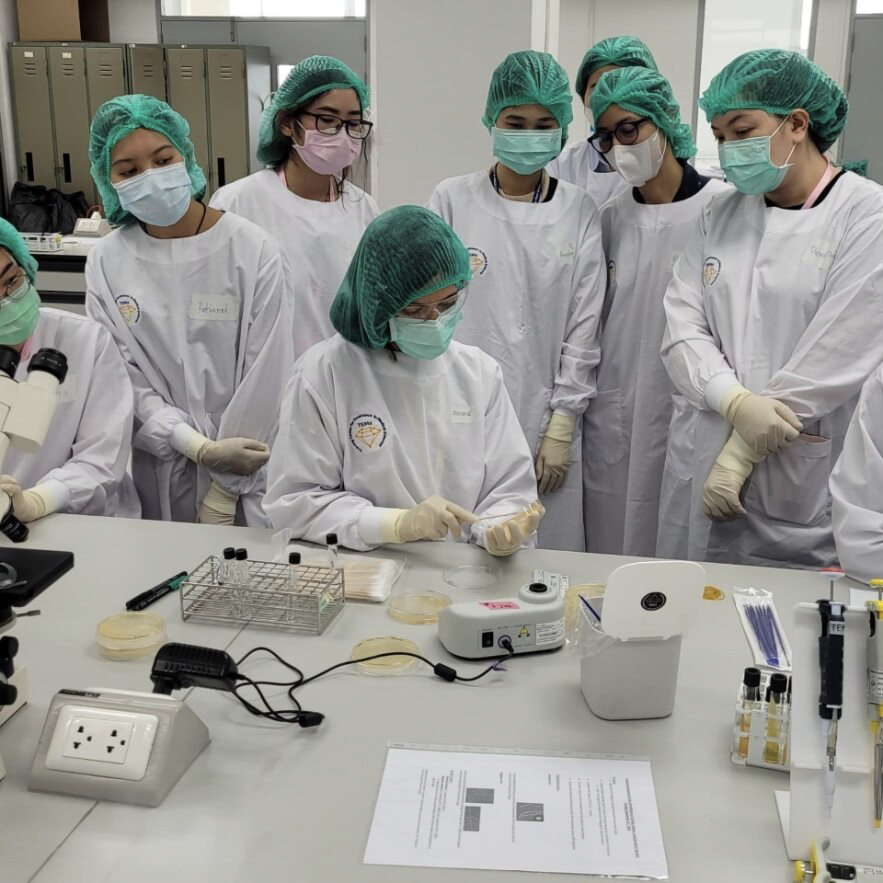 LLS officer Roxana Rodriguez Stewart, PhD (seated), trains lab staff at training center in Thailand.