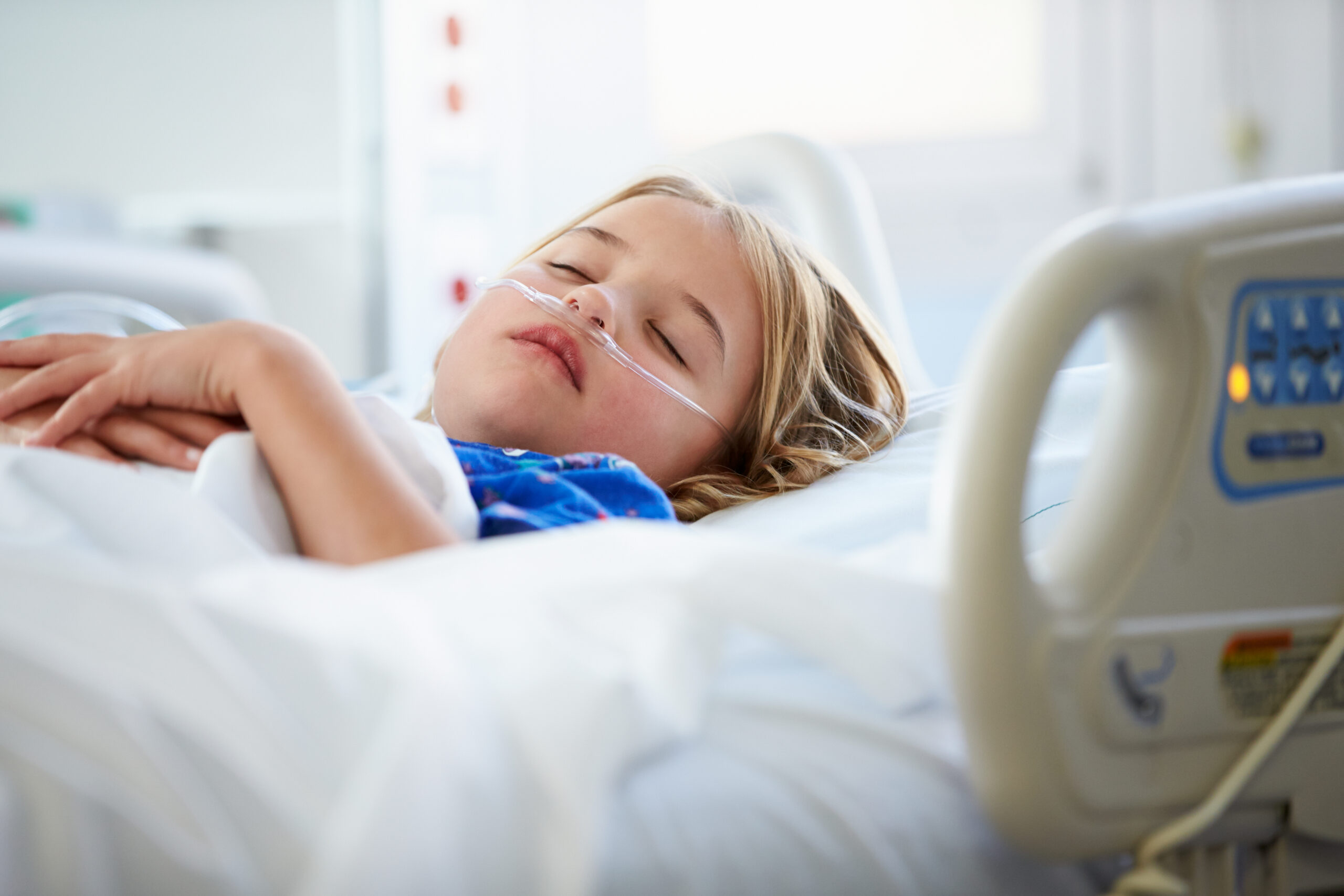 Image of child in hospital bed