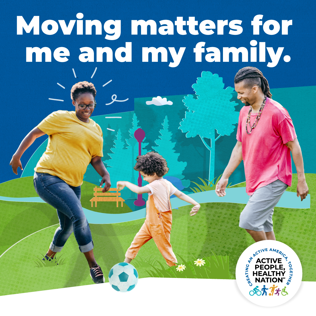 Family playing soccer