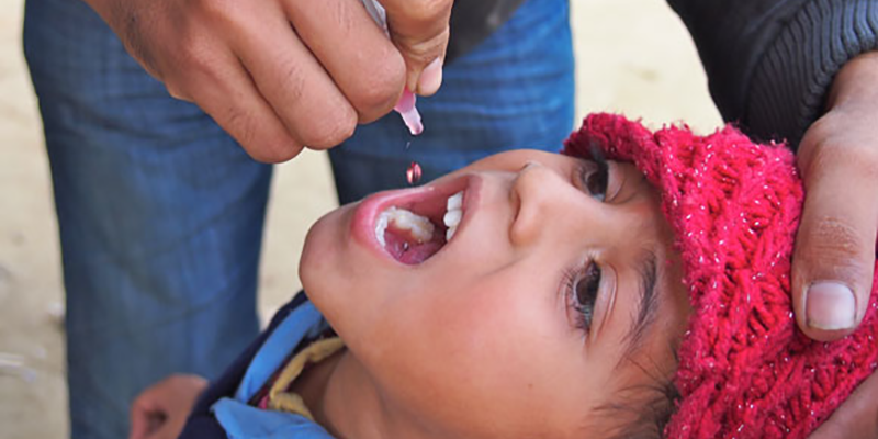 cdcwork02 Child receiving polio vaccine