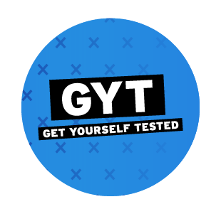 Circle with blue background and the message "GYT Get Yourself Tested"