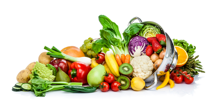 Picture of a variety of fruits and vegetables piled together.