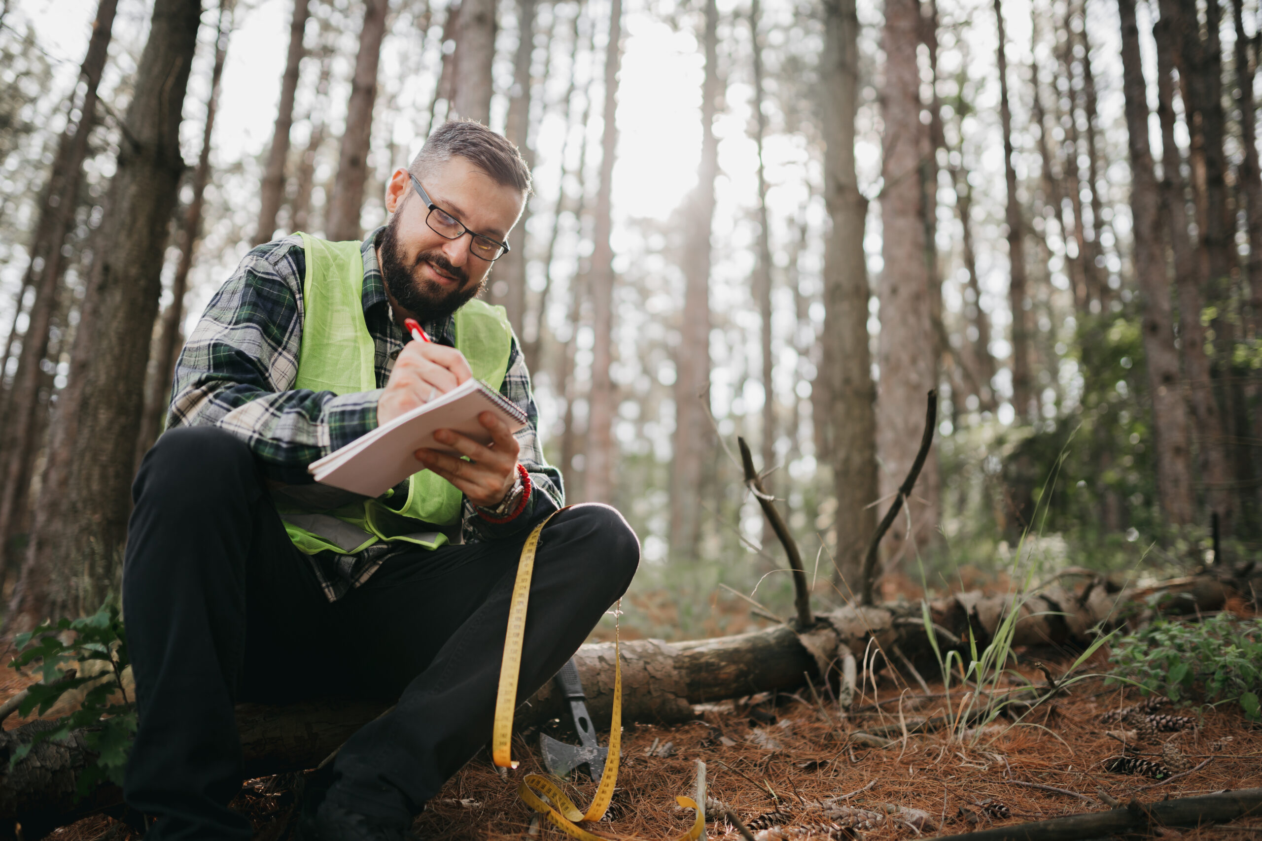 man working alone in the woods
