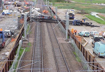 Image of Overturned Drill Rig that fell across nearby railroad tracks. (Image from ADSC)