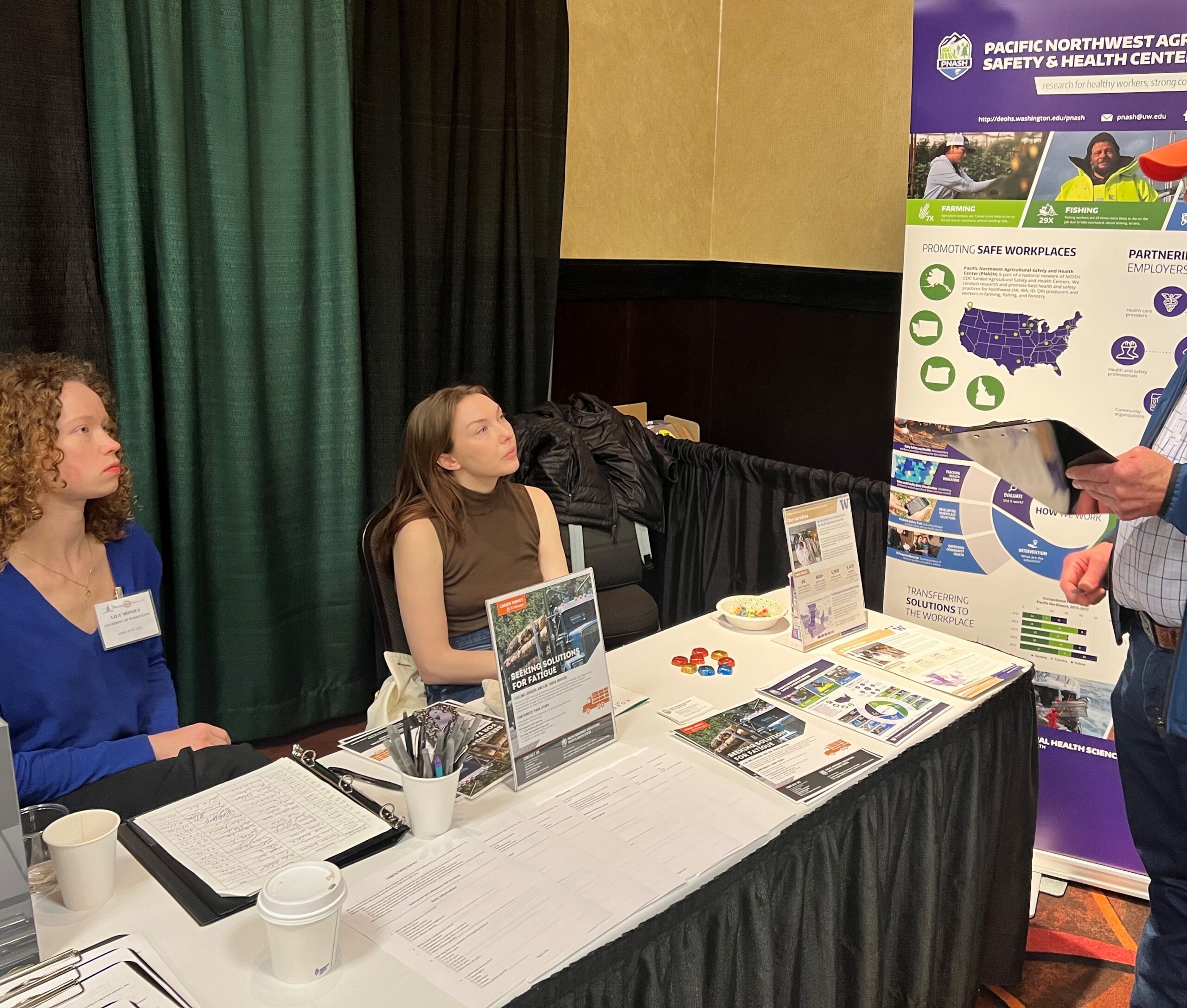 PNASH researchers collect surveys from loggers and log truck drivers at the April 2022 Intermountain Logging Conference in Spokane WA