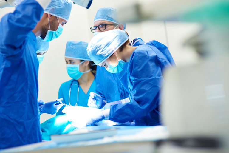 Photos of healthcare workers in an operating room.