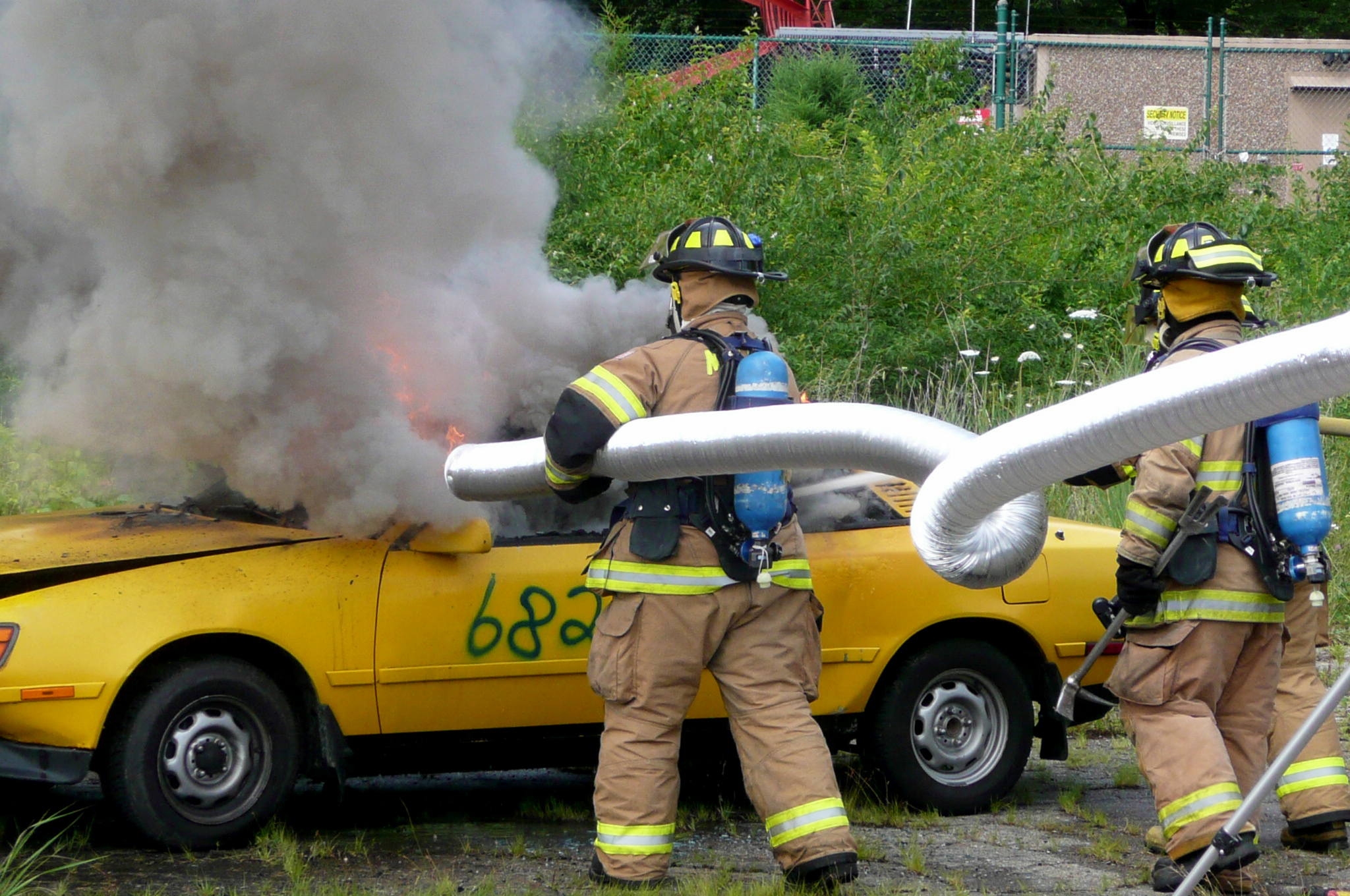 Photo of HHE investigators evaluated chemical and particle exposures during firefighter training.