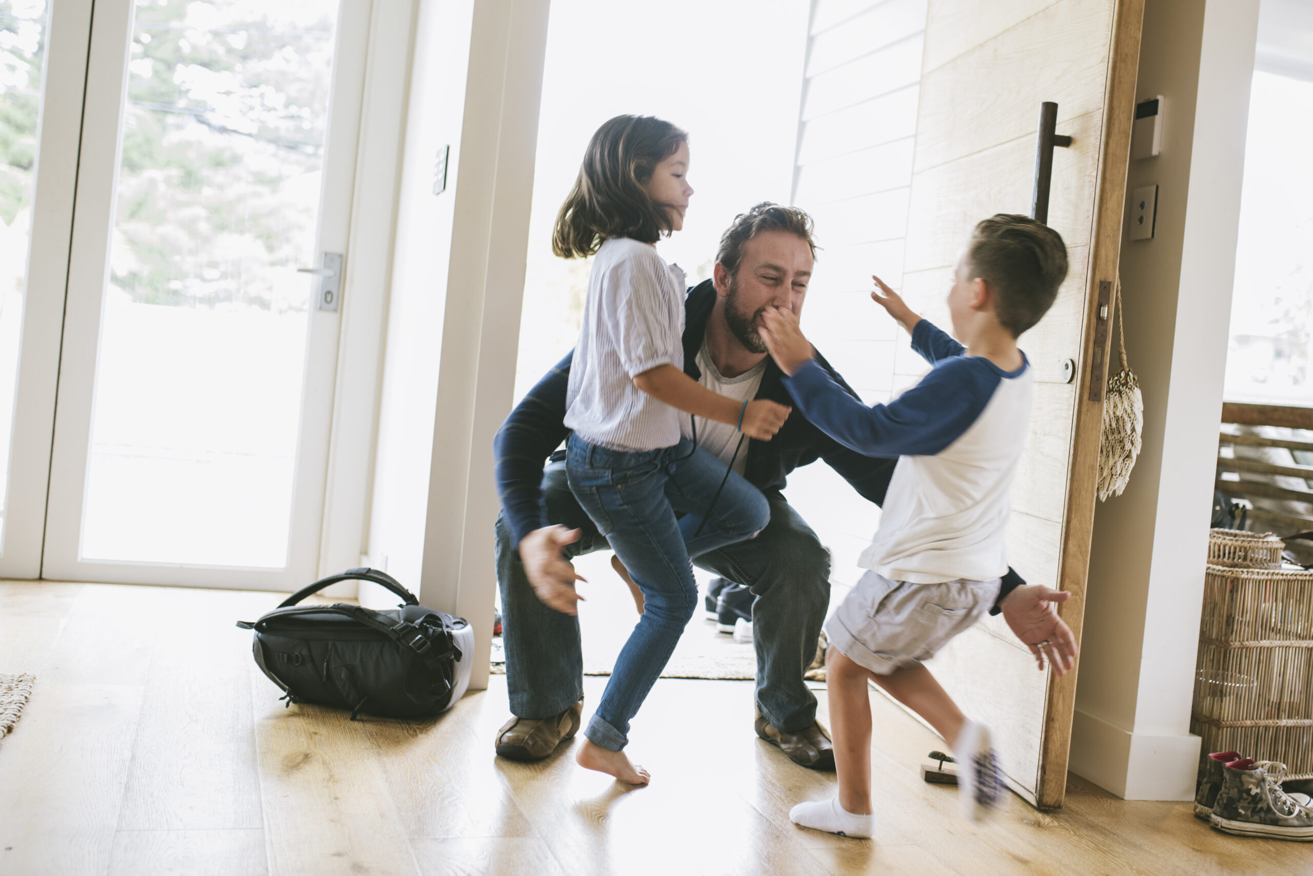 Man playing with kids.