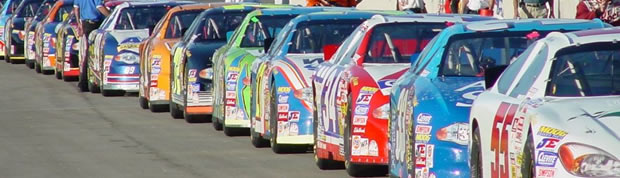 Image of racecars lined up.