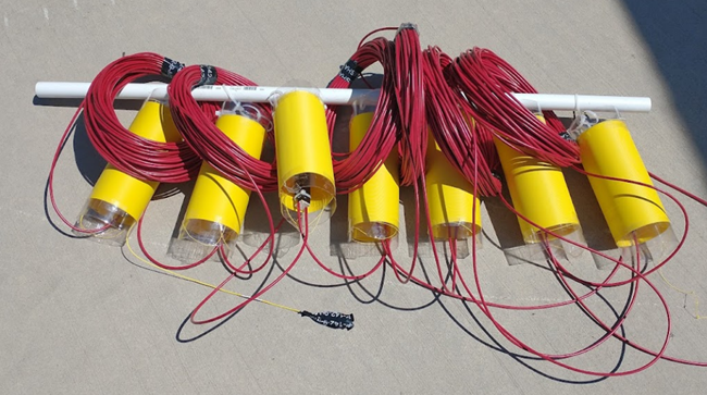 Figure 2. DAS seismoacoustic array. The array consists of lead cables (red) and microphones (yellow).