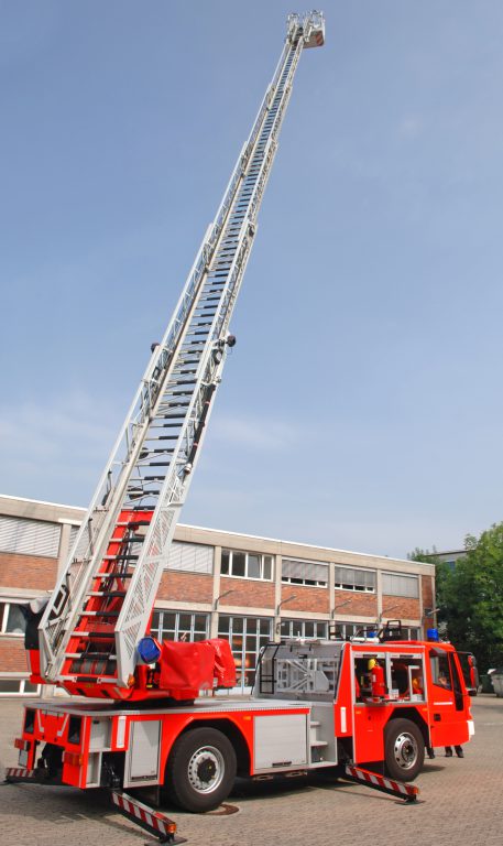 Image of firetruck with ladder up.