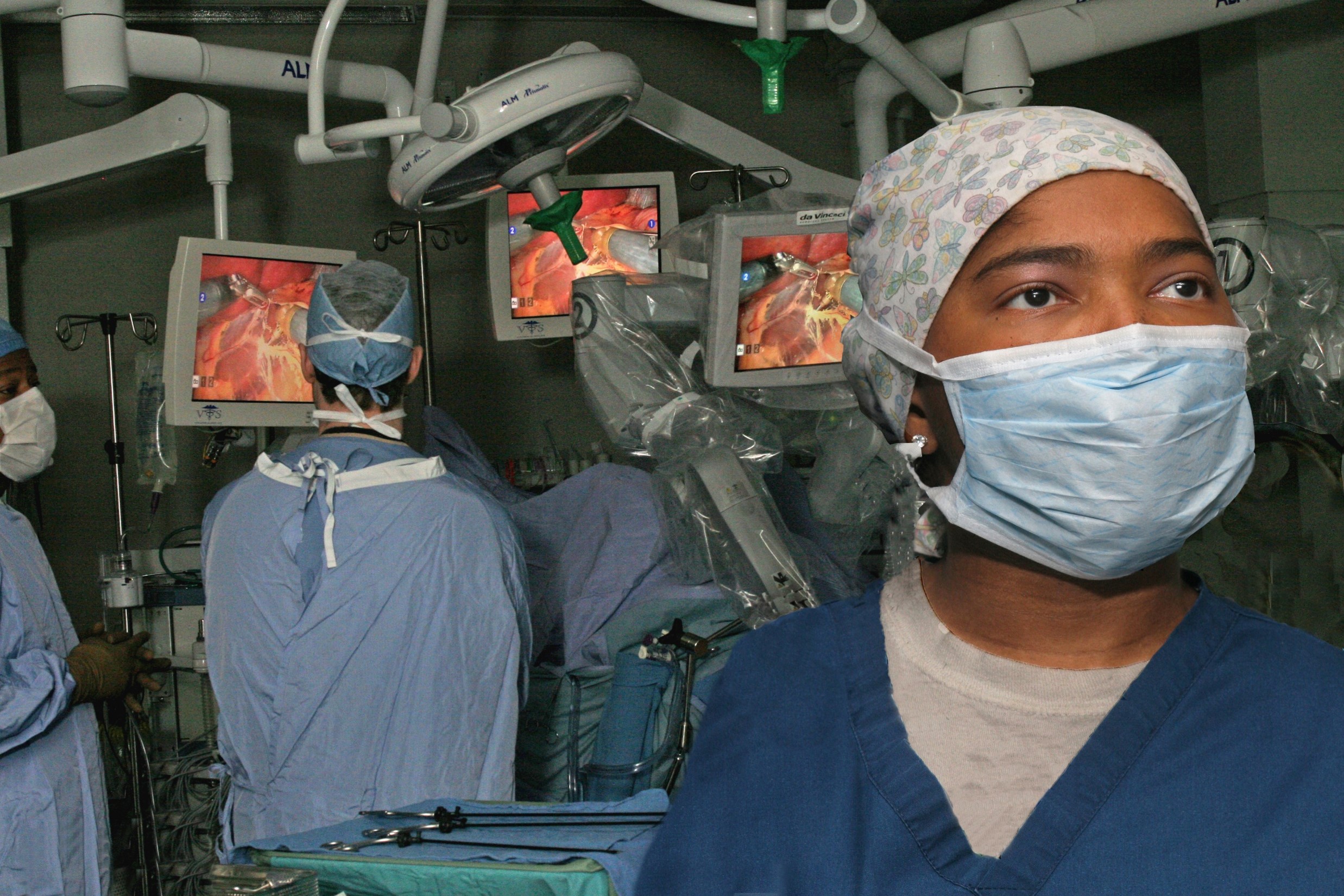 Perioperative nurse during a gastric band robotically assisted bypass surgery.