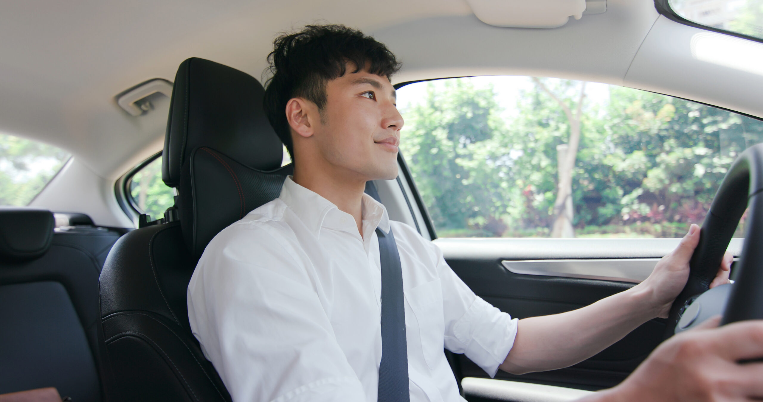 photo of a teen boy driving