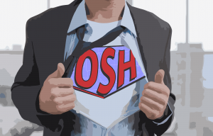Man holding open jacket to show a tshirt that says OSH like superman.