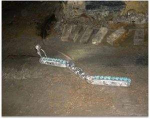 Figure 1. Mining Robot: A “snake” robotic is lowered down a borehole and relays vital information back to the surface to aide rescue efforts.