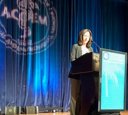 Alysha Meyers accepting the Adolph G. Kammer Merit in Authorship Award