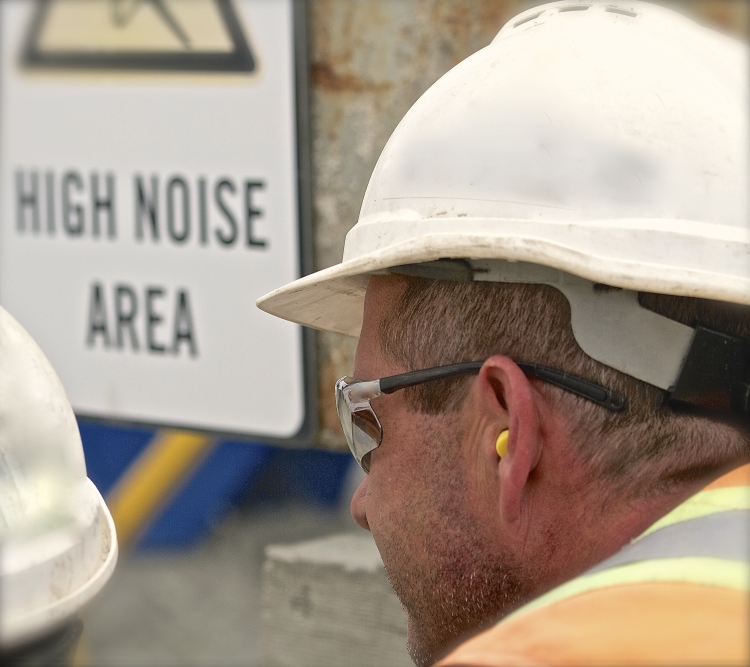 construction worker with hearing protection.