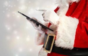 Image of Santa looking at a list