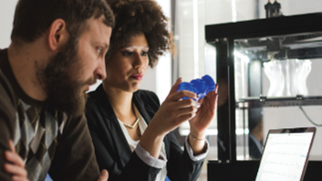a man and a woman using 3D printing