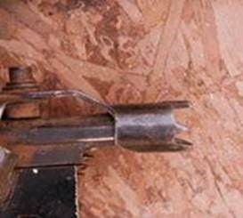 Workpiece safety contact located at the tip of the nail gun.