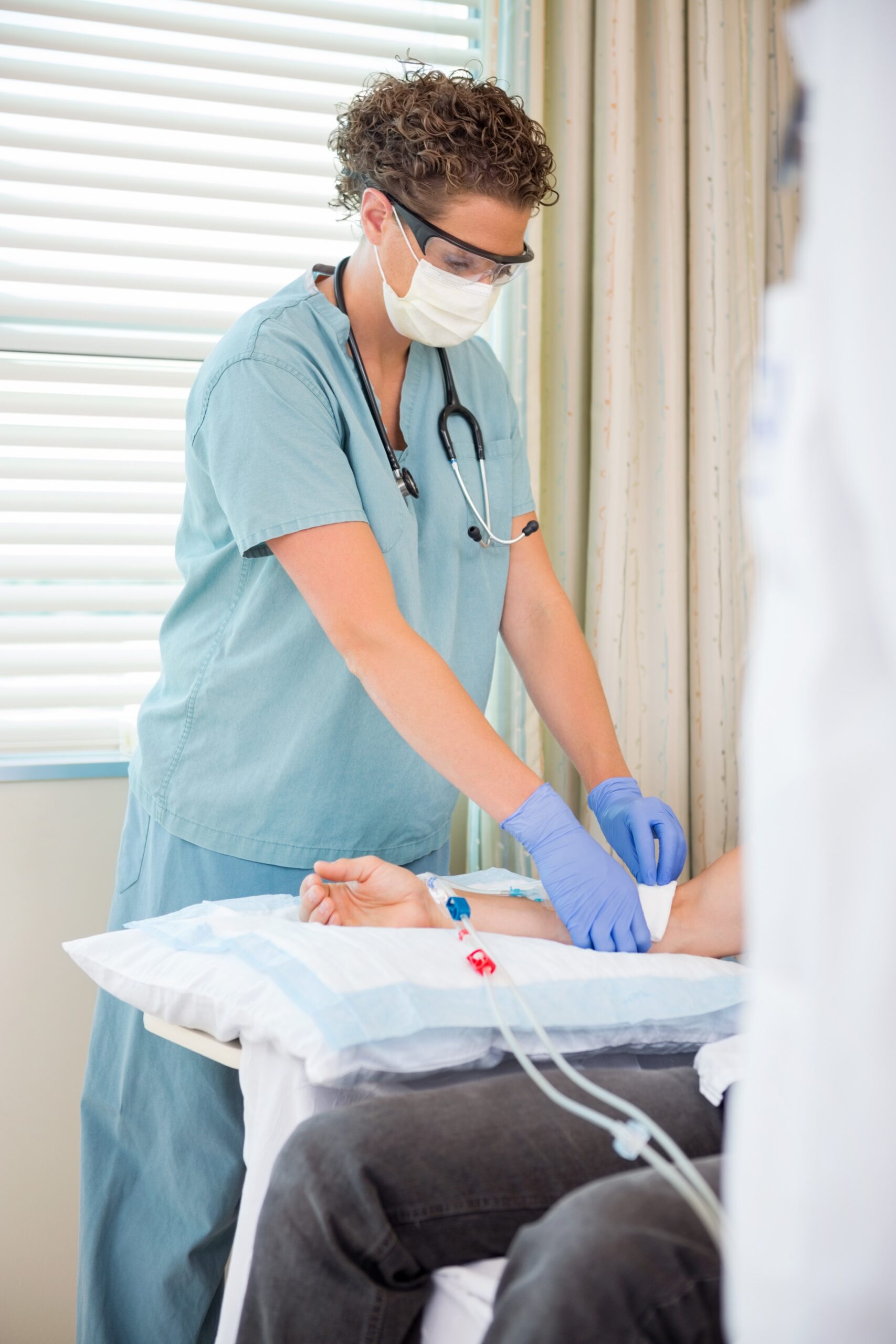 Healthcare worker wearing a surgical mask.