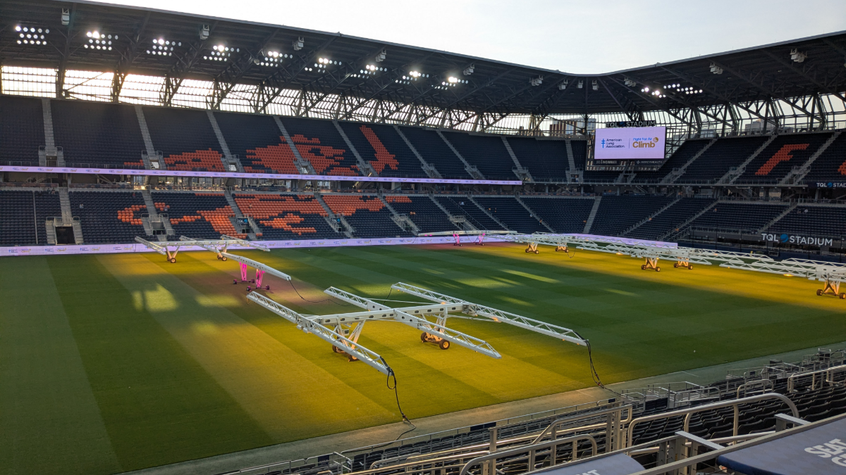 Soccer stadium showing field and empty seats