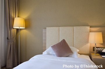 M7B A photo of a bed in a bedroom
