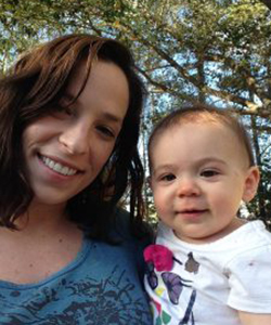 Mother holding baby daughter